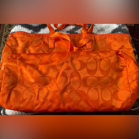 Orange Coach-like design duffel bag with removable inside zipper pouch. - Picture 3 of 7